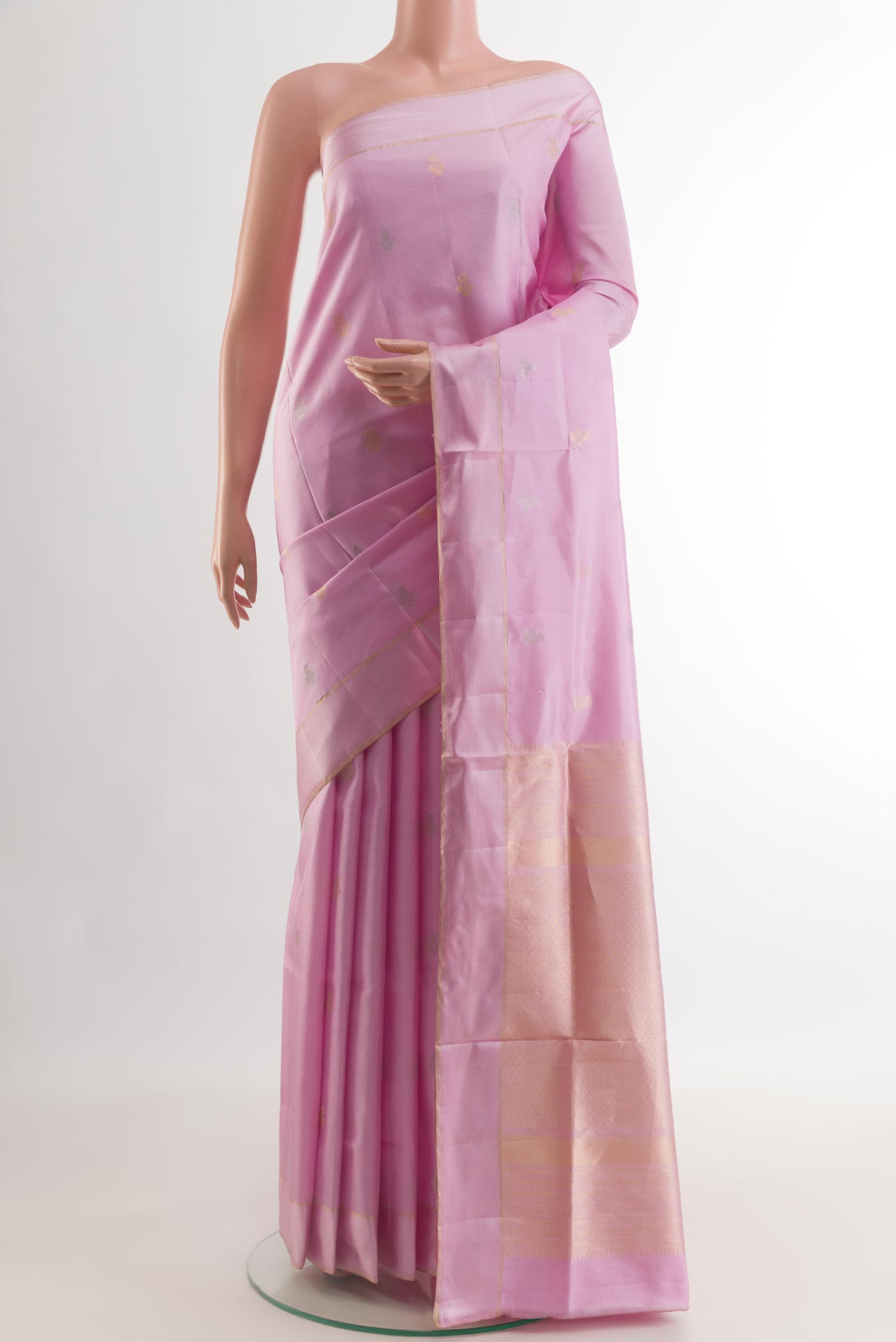 Lavender Soft Silk Saree with Zari Butta on the body and Thread Border.  displayed on a mannequin