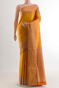 Mustard Soft Silk Saree with Zari Butta on the body and Zari Border.  displayed on a mannequin