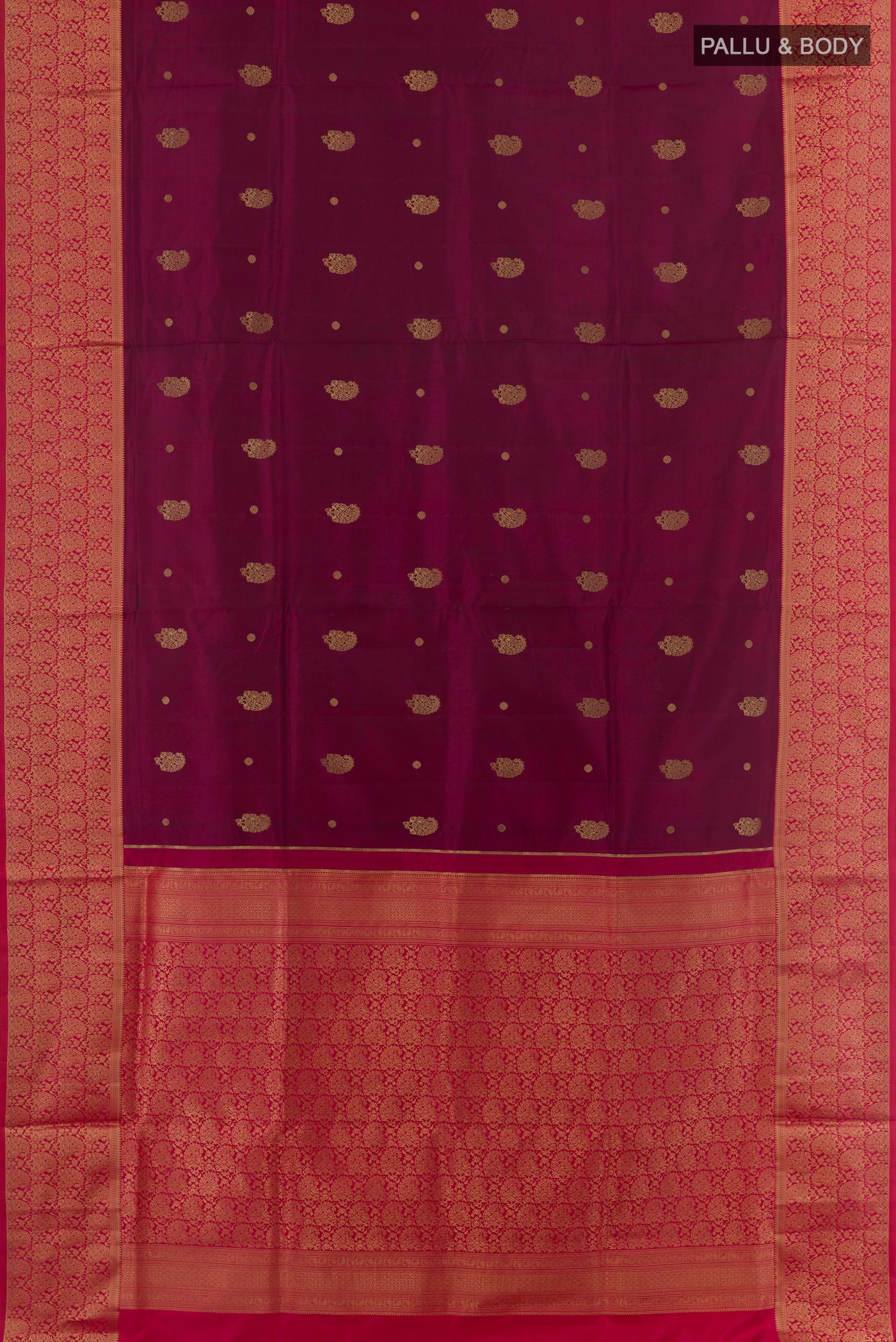 Flat view of Maroon Soft Silk Saree with Zari Butta on the body and Zari Border. 
