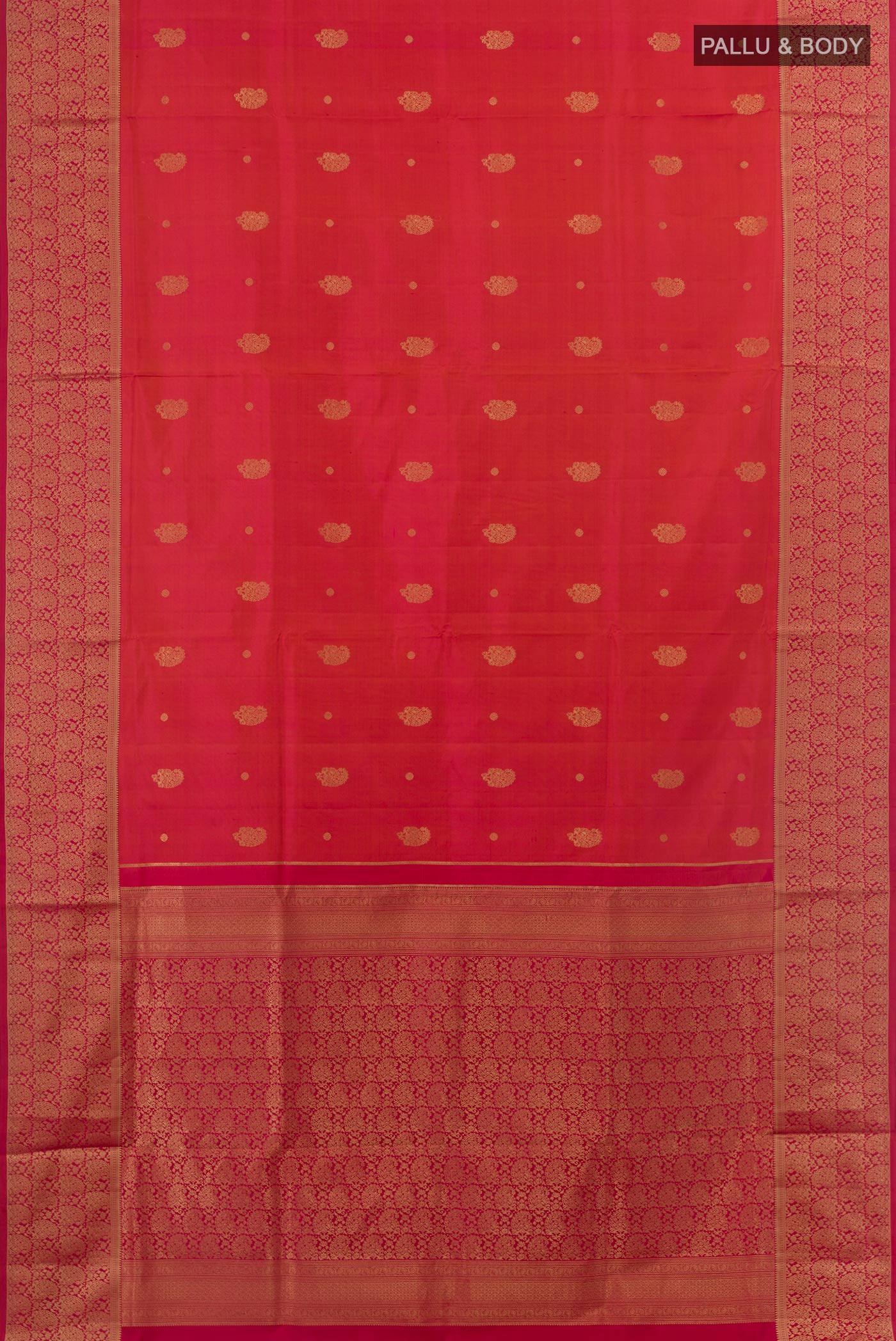 Flat view of Coral Soft Silk Saree with Zari Butta on the body and Zari Border. 