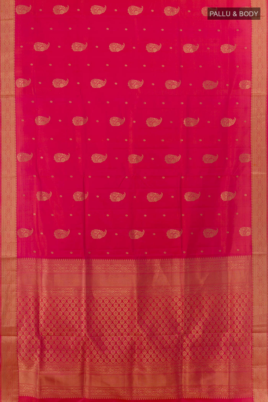 Flat view of Pink Soft Silk Saree with Zari Butta on the body and Zari Border. 