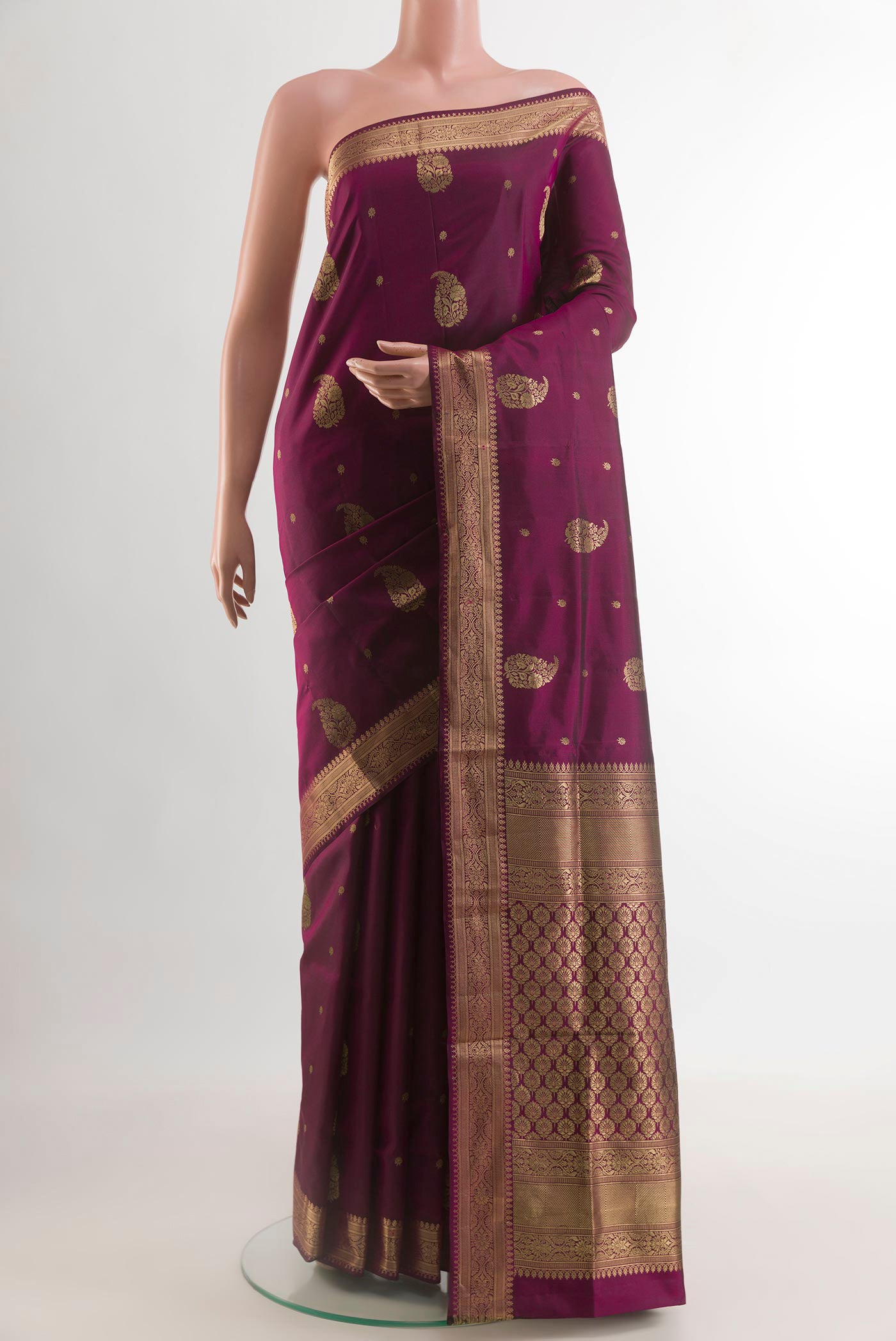 Purple Soft Silk Saree with Zari Butta on the body and Zari Border.  displayed on a mannequin
