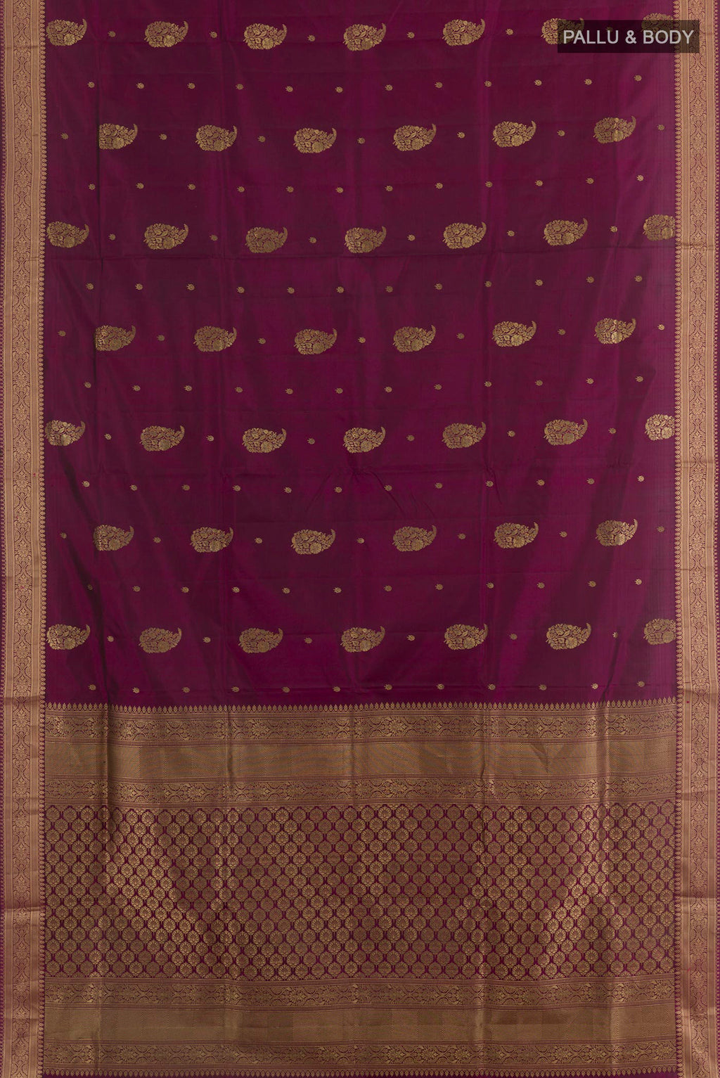 Flat view of Purple Soft Silk Saree with Zari Butta on the body and Zari Border. 