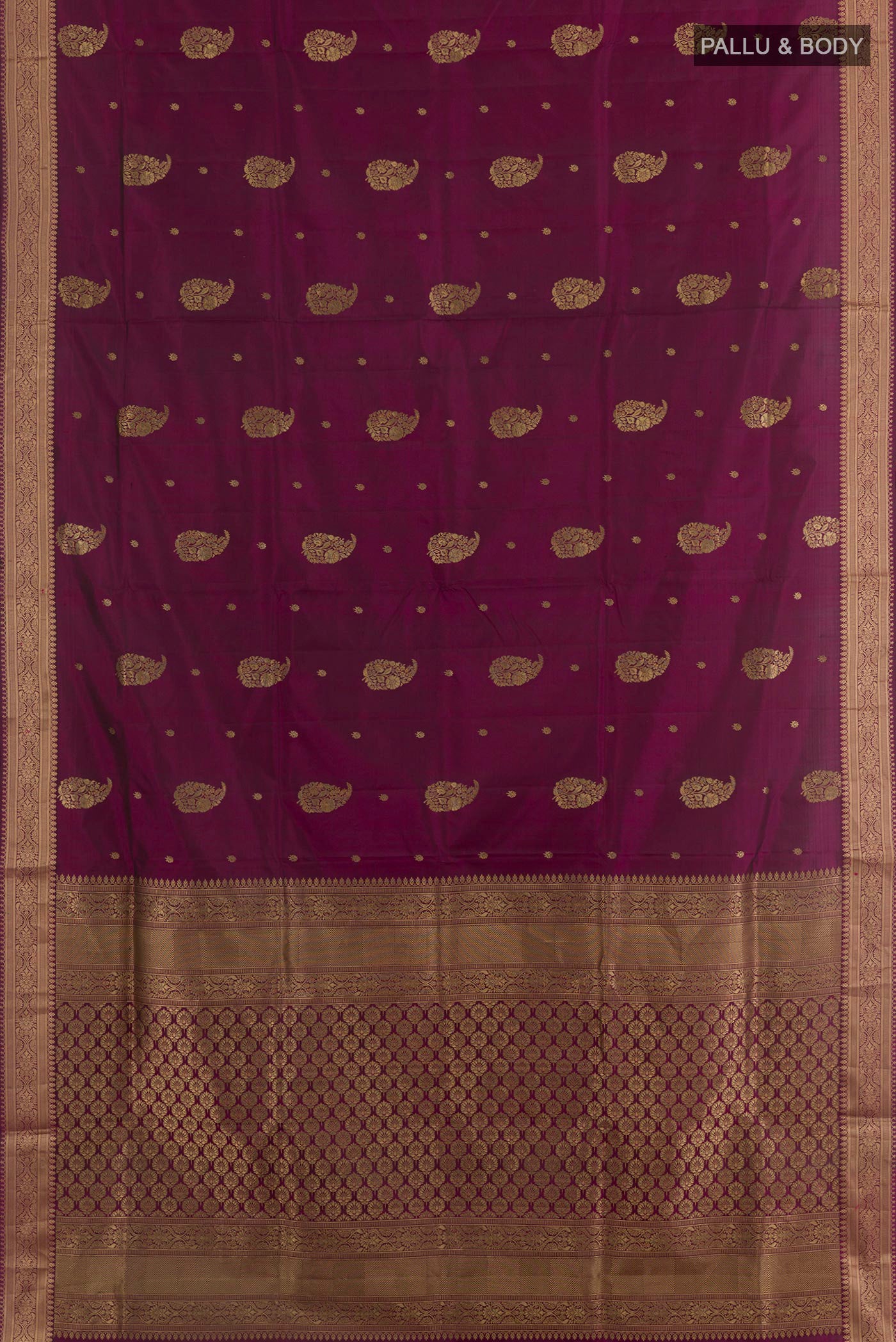 Flat view of Purple Soft Silk Saree with Zari Butta on the body and Zari Border. 