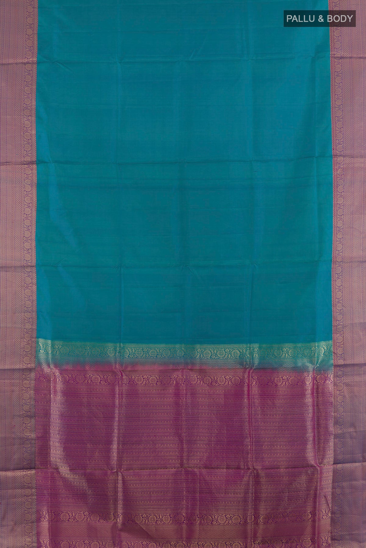 Flat view of Pure Silk Turquoise Soft Saree with Plain Body and Zari Border. 