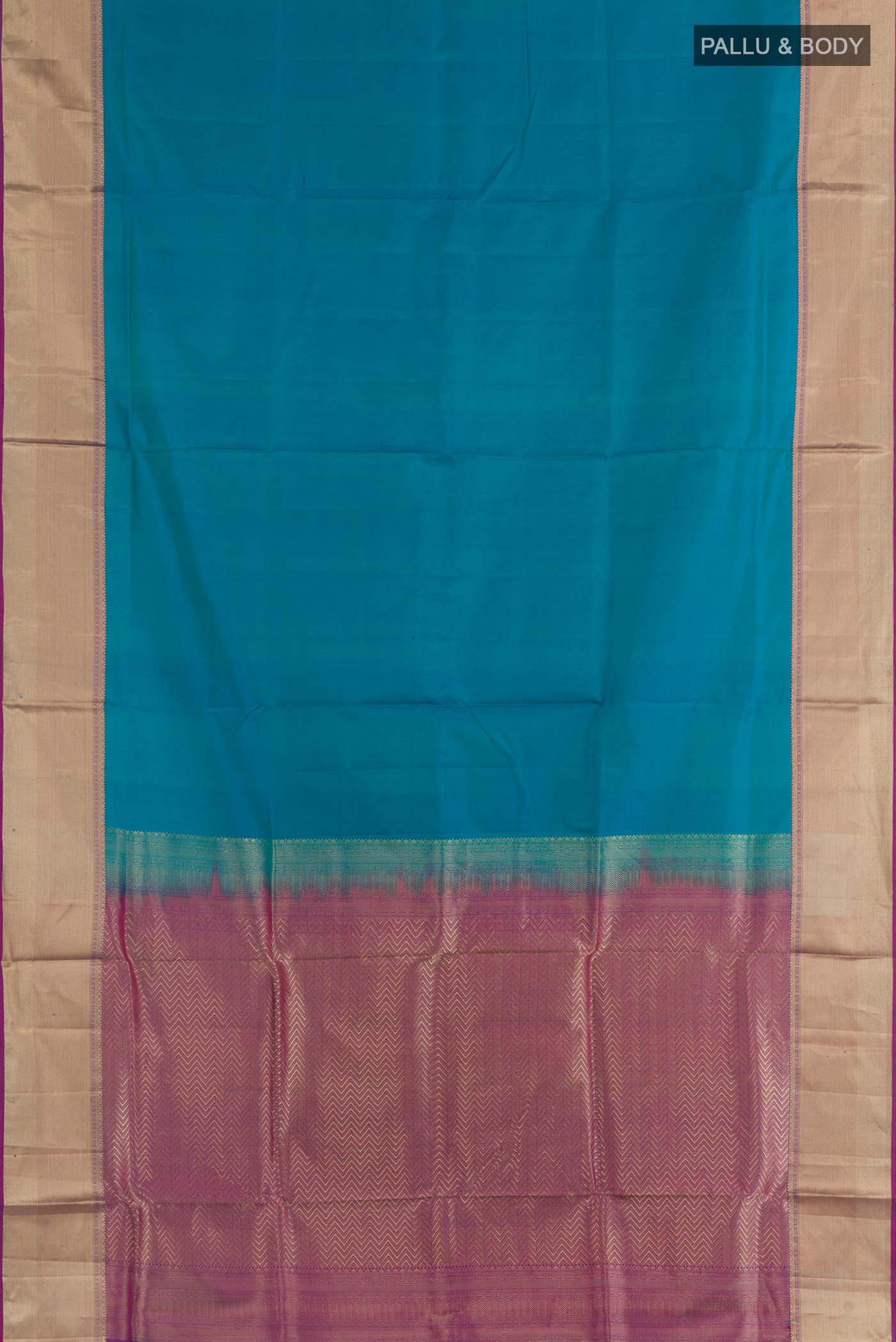 Flat view of Blue Soft Silk Saree with Plain Body and Zari Border. 