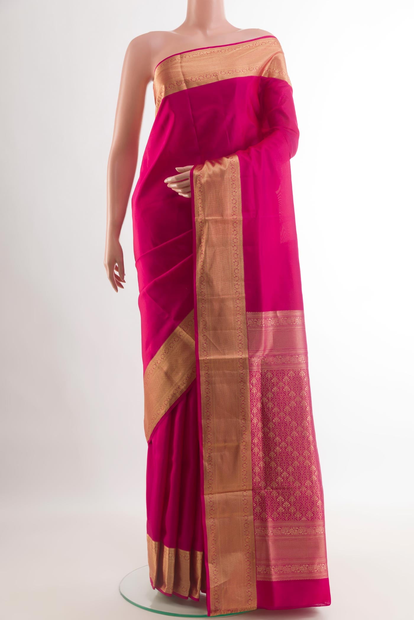 Pink Soft Silk Saree with Plain Body and Zari Border.  displayed on a mannequin