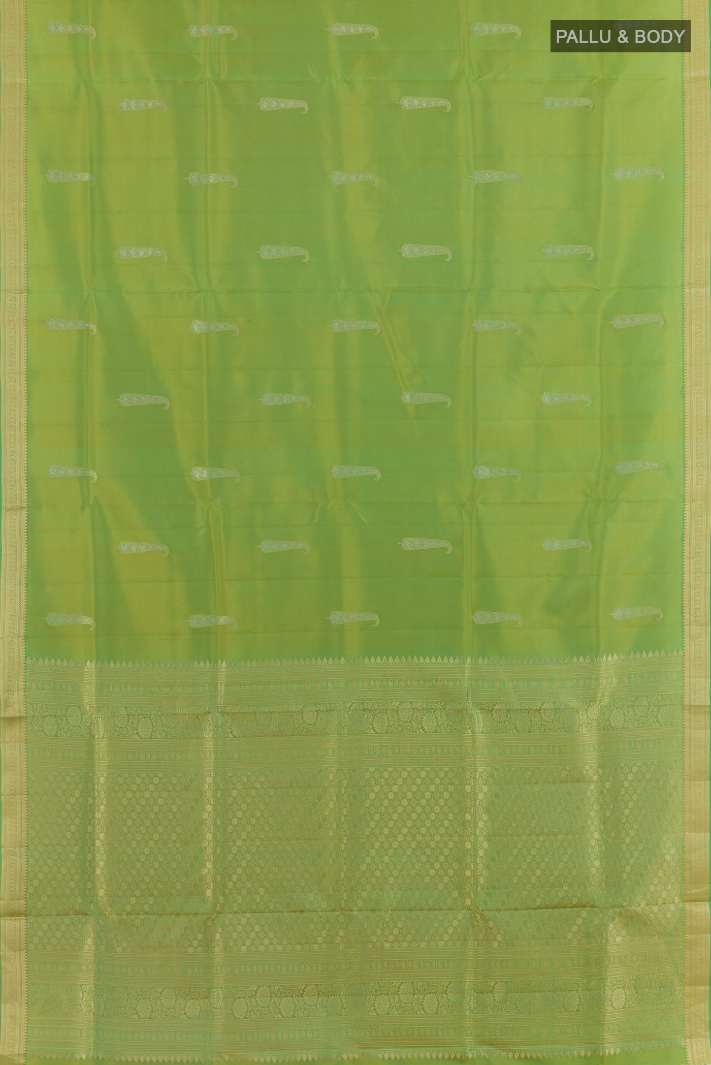 Flat view of Green Soft Silk Saree with Zari Butta on the body and Zari Border. 