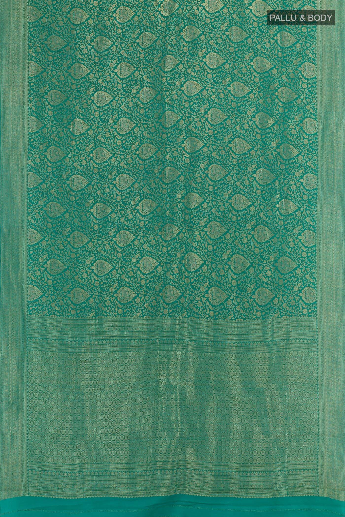 Flat view of Sea Green Mysore Crepe Saree with Zari Brocade on the body and Zari Border. 