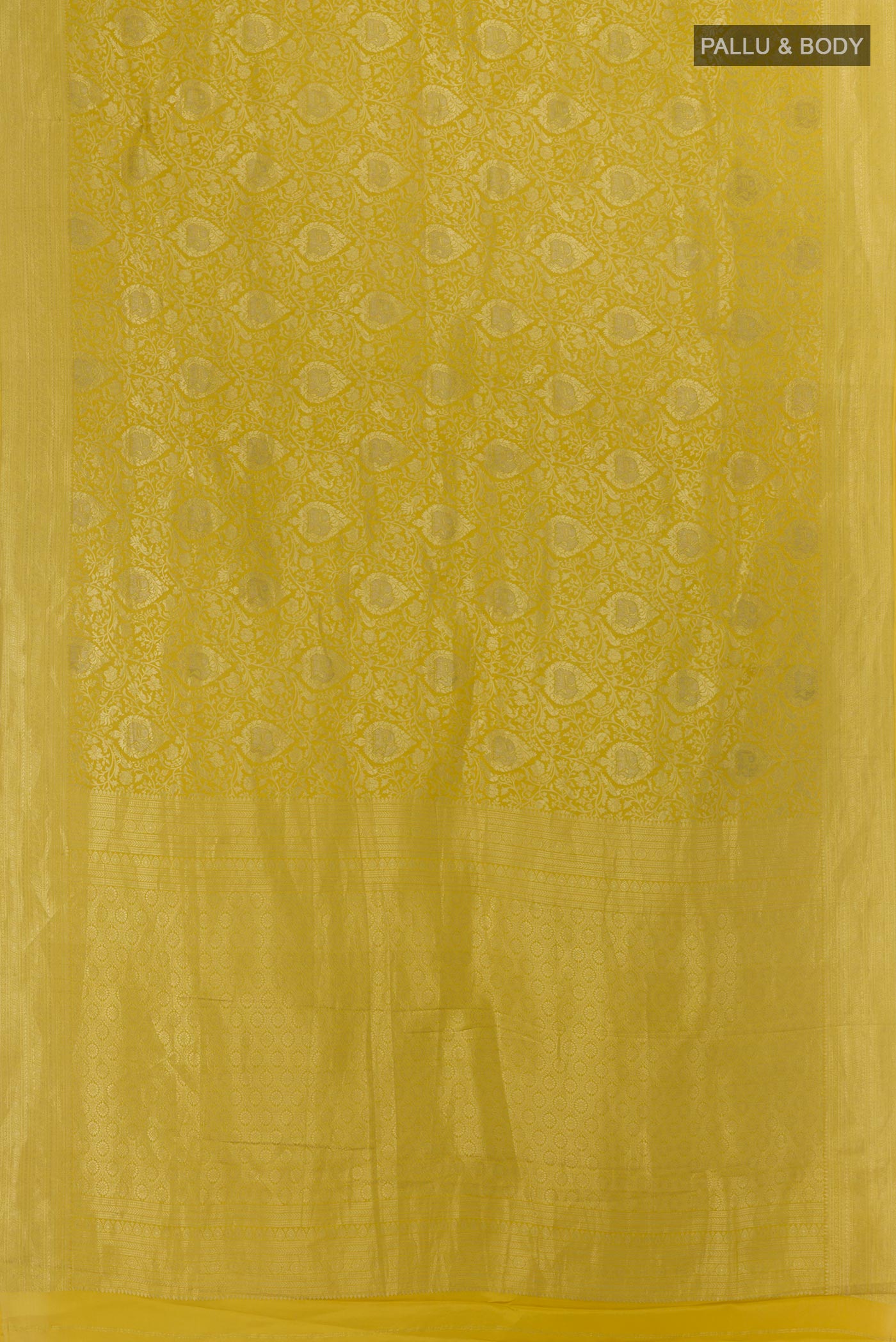 Flat view of Yellow Mysore Crepe Saree with Zari Brocade on the body and Zari Border. 
