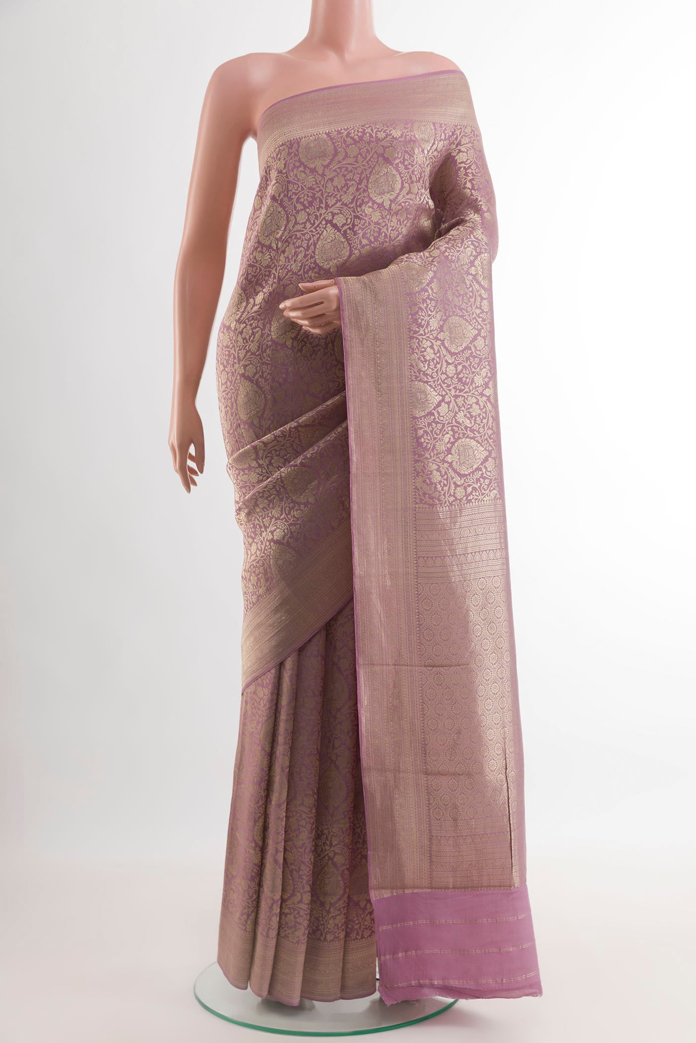 Lavender Mysore Crepe Saree with Zari Brocade on the body and Zari Border.  displayed on a mannequin