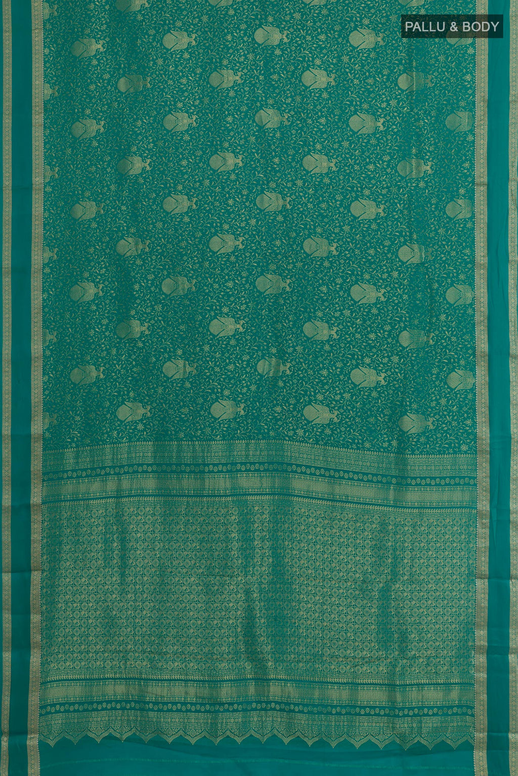 Flat view of Sea Green Mysore Crepe Saree with Zari Brocade on the body and Zari Border. 