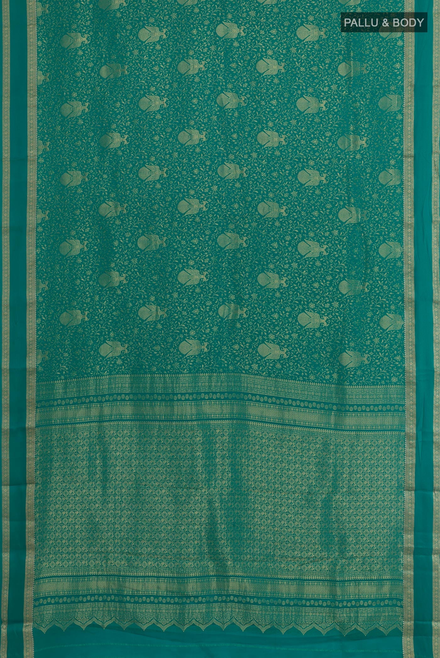 Flat view of Sea Green Mysore Crepe Saree with Zari Brocade on the body and Zari Border. 