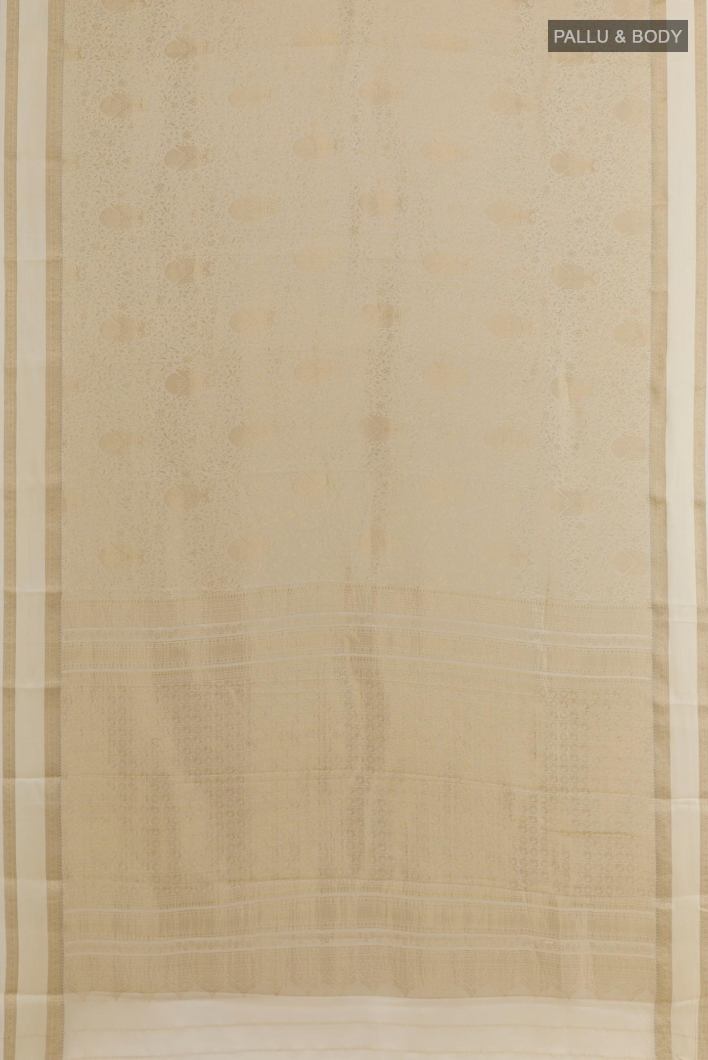 Flat view of Off White Mysore Crepe Saree with Zari Brocade on the body and Zari Border. 