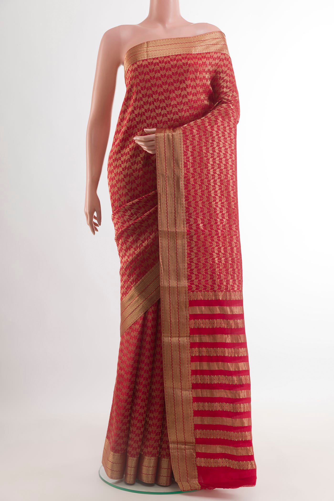 Red Mysore Crepe Saree with Zari Brocade on the body and Zari Border.  displayed on a mannequin