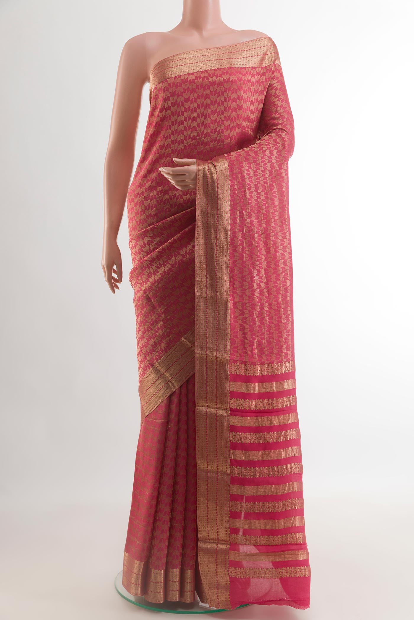 Pink Mysore Crepe Saree with Zari Brocade on the body and Zari Border.  displayed on a mannequin