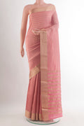 Peach Mysore Crepe Saree with Zari Brocade on the body and Zari Border.  displayed on a mannequin