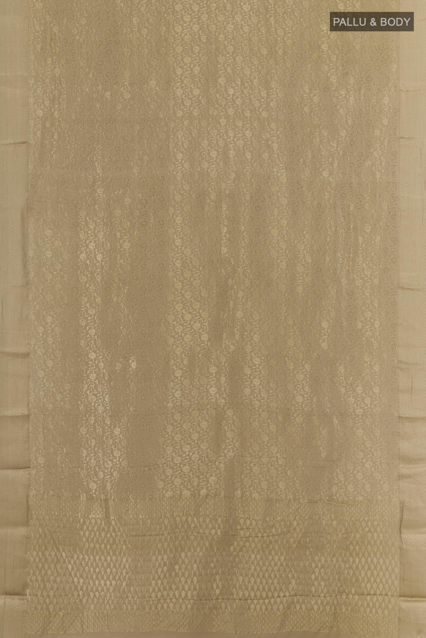 Flat view of Beige Mysore Crepe Saree with Zari Brocade on the body and Zari Border. 