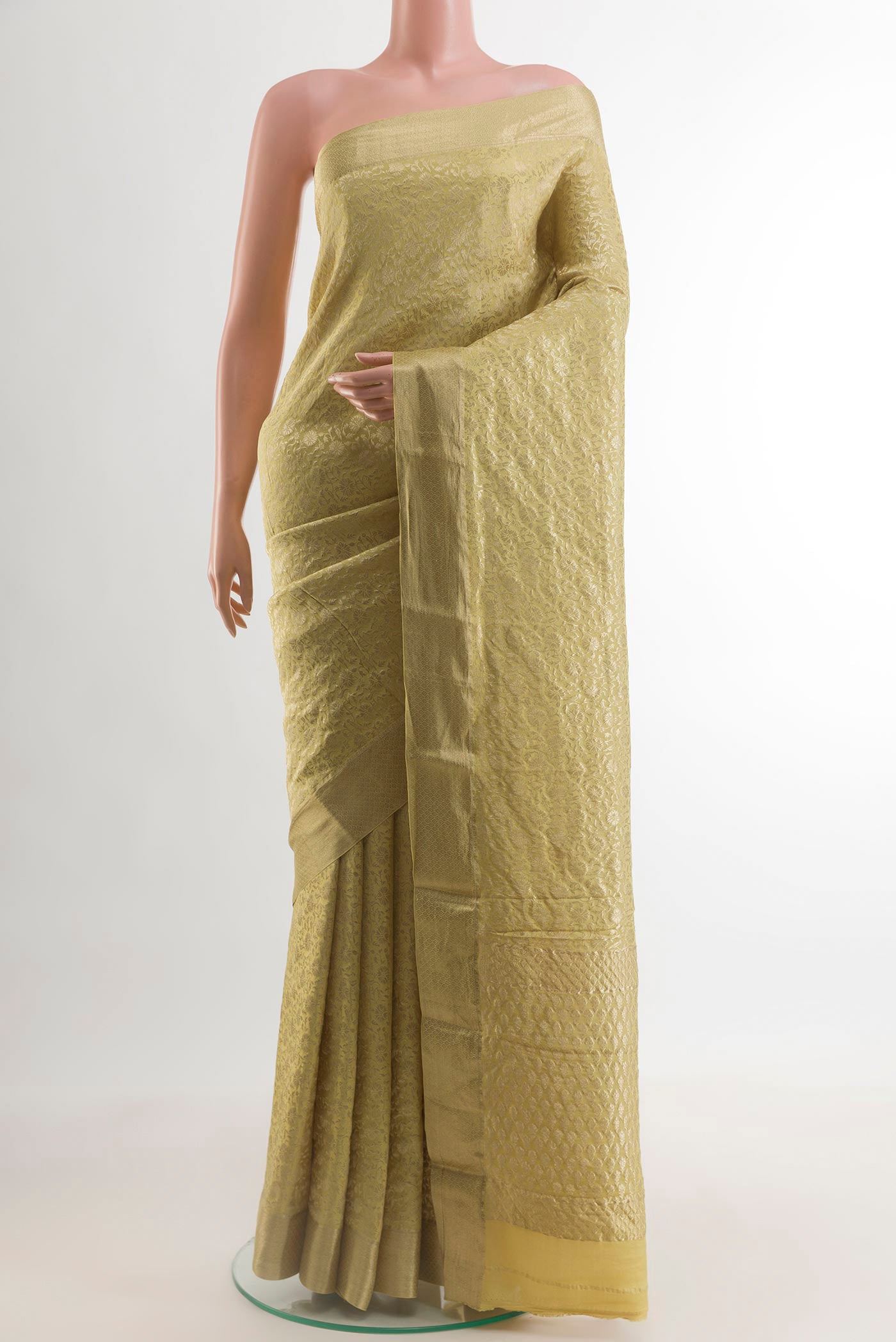 Sandal Mysore Crepe Saree with Zari Brocade on the body and Zari Border.  displayed on a mannequin