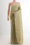 Light Green Mysore Crepe Saree with Zari Brocade on the body and Zari Border.  displayed on a mannequin