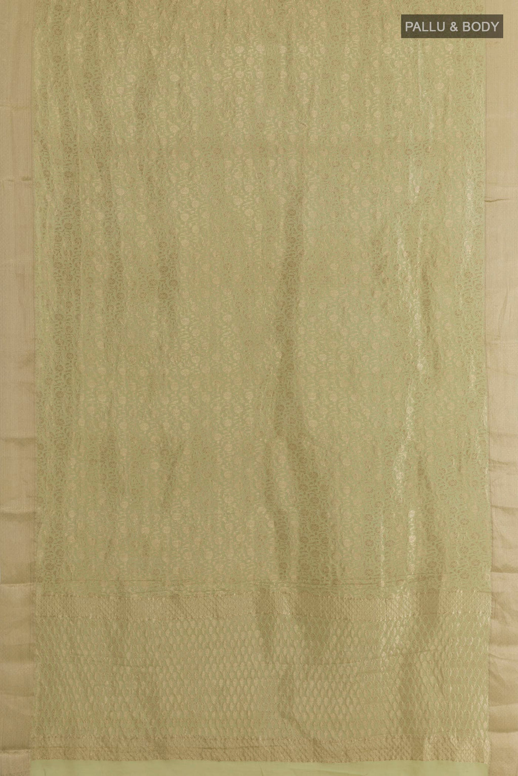 Flat view of Light Green Mysore Crepe Saree with Zari Brocade on the body and Zari Border. 