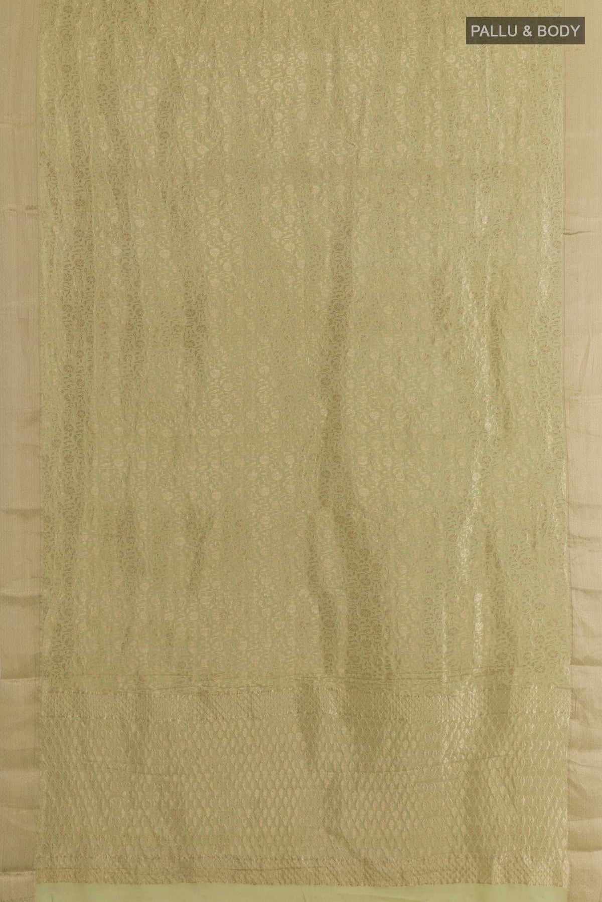 Flat view of Light Green Mysore Crepe Saree with Zari Brocade on the body and Zari Border. 