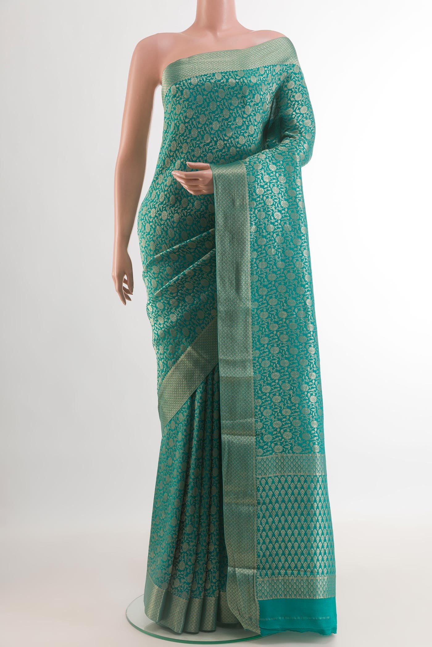 Blue Mysore Crepe Saree with Zari Brocade on the body and Zari Border.  displayed on a mannequin