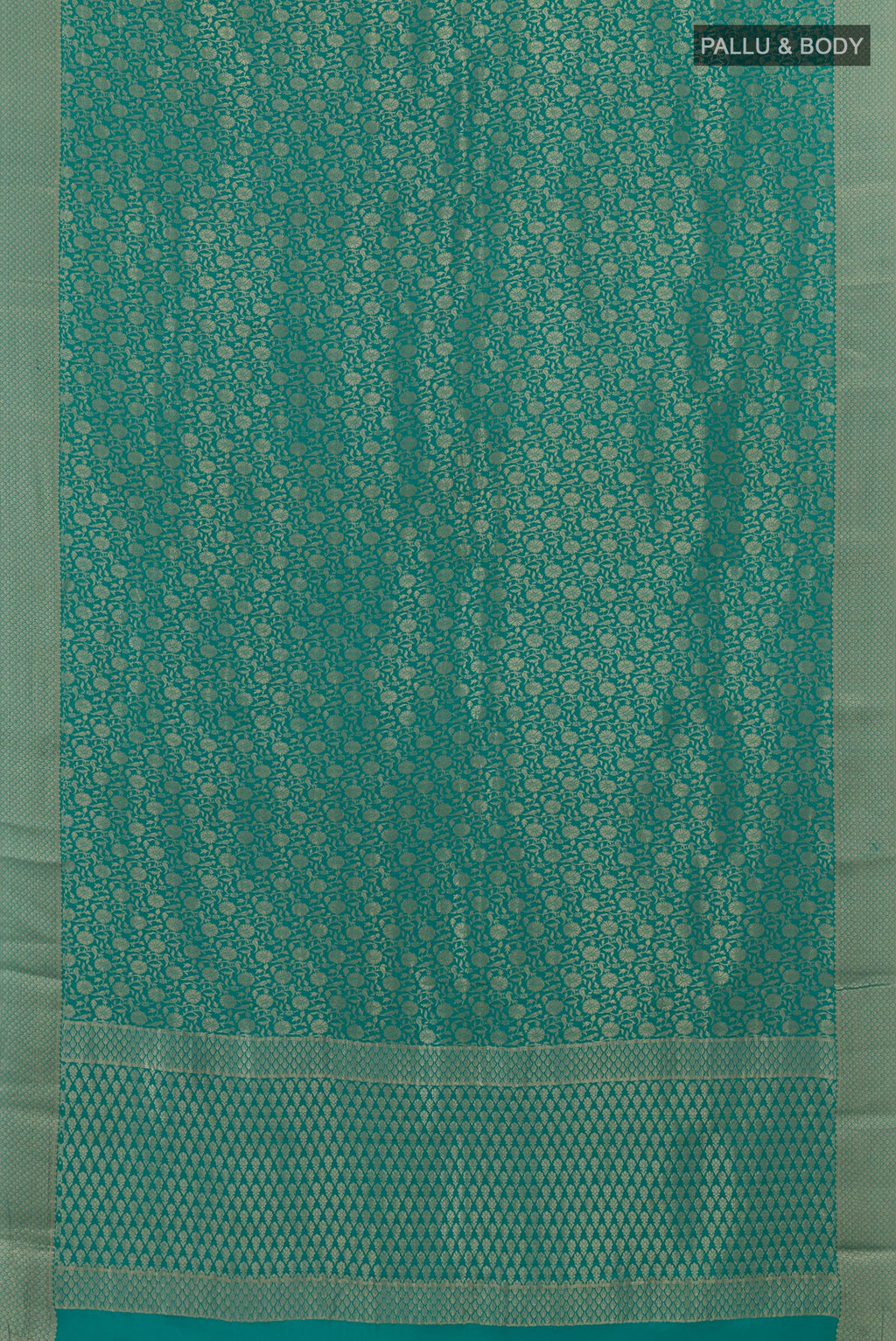 Flat view of Blue Mysore Crepe Saree with Zari Brocade on the body and Zari Border. 