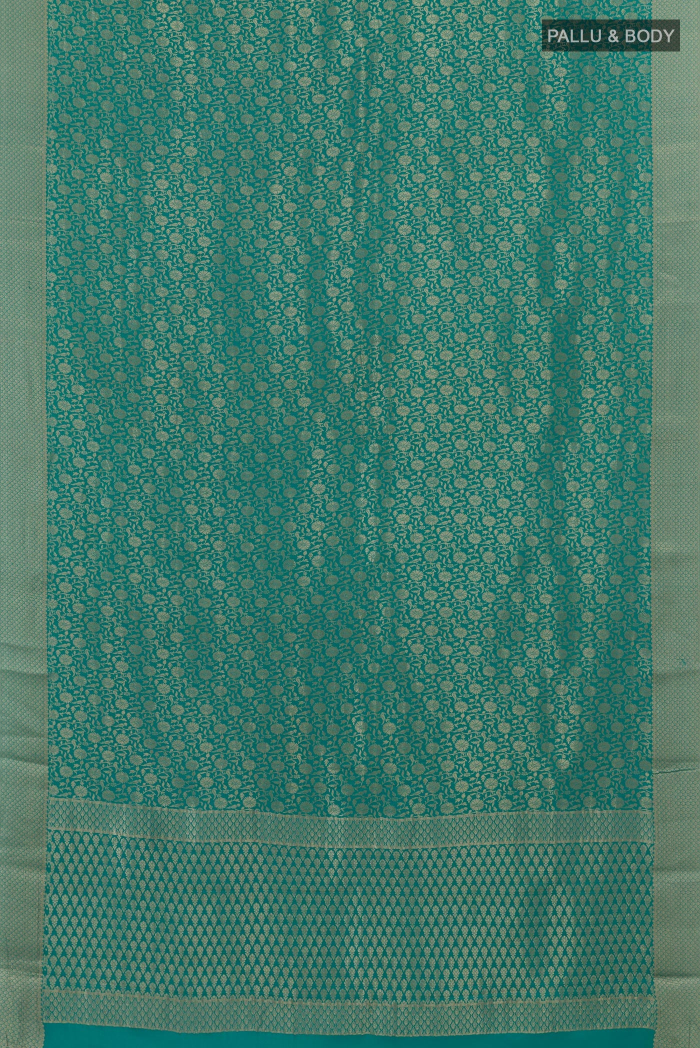 Flat view of Blue Mysore Crepe Saree with Zari Brocade on the body and Zari Border. 