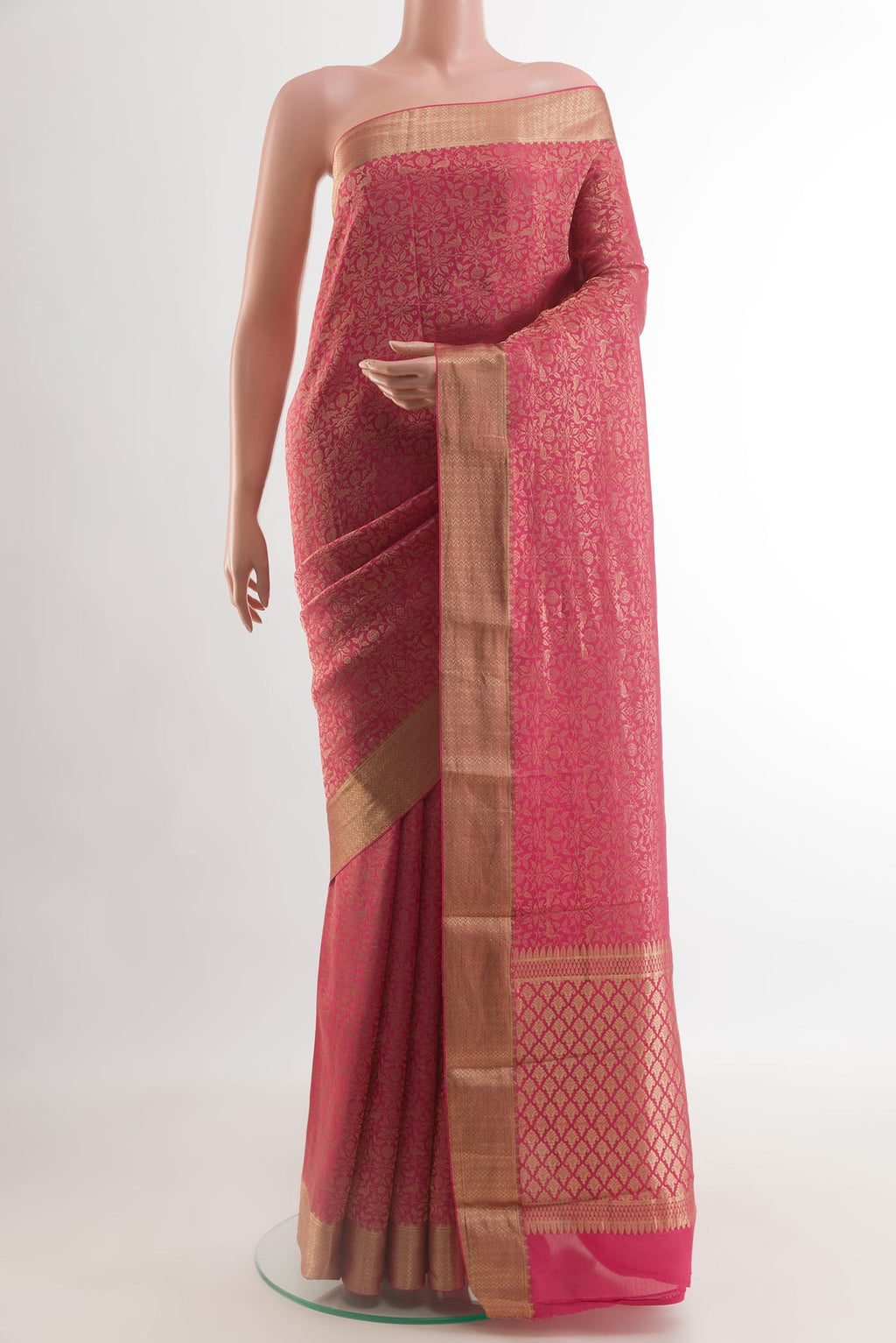 Pink Mysore Crepe Saree with Zari Brocade on the body and Zari Border.  displayed on a mannequin