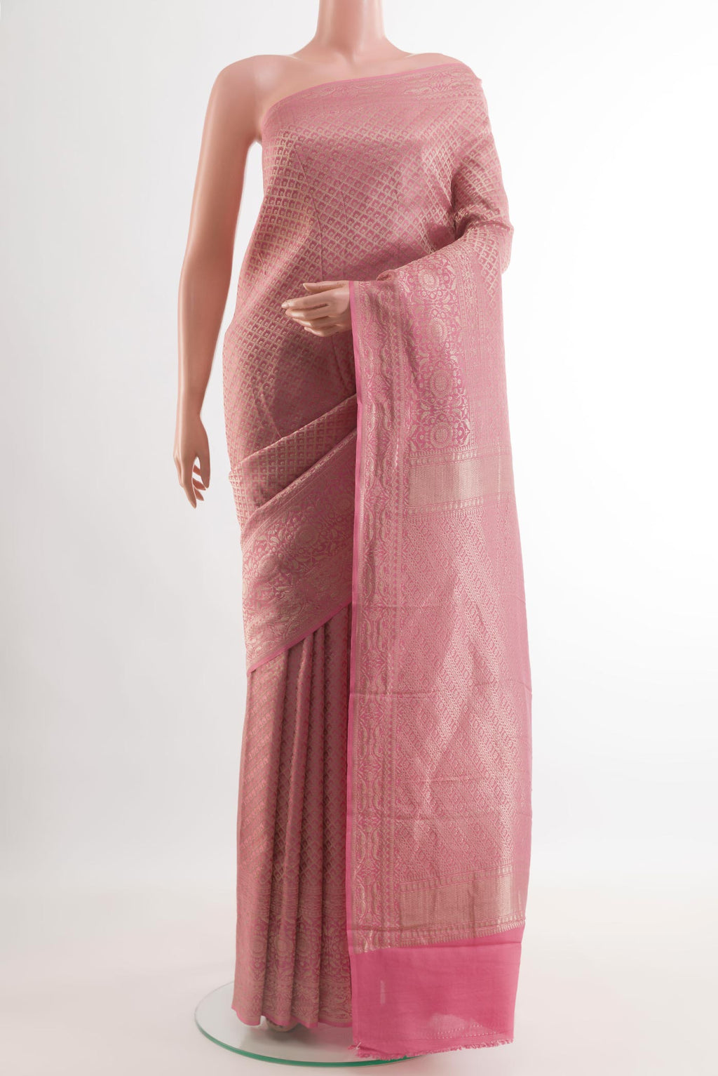Pink Mysore Crepe Saree with Zari Butta on the body and Zari Border.  displayed on a mannequin