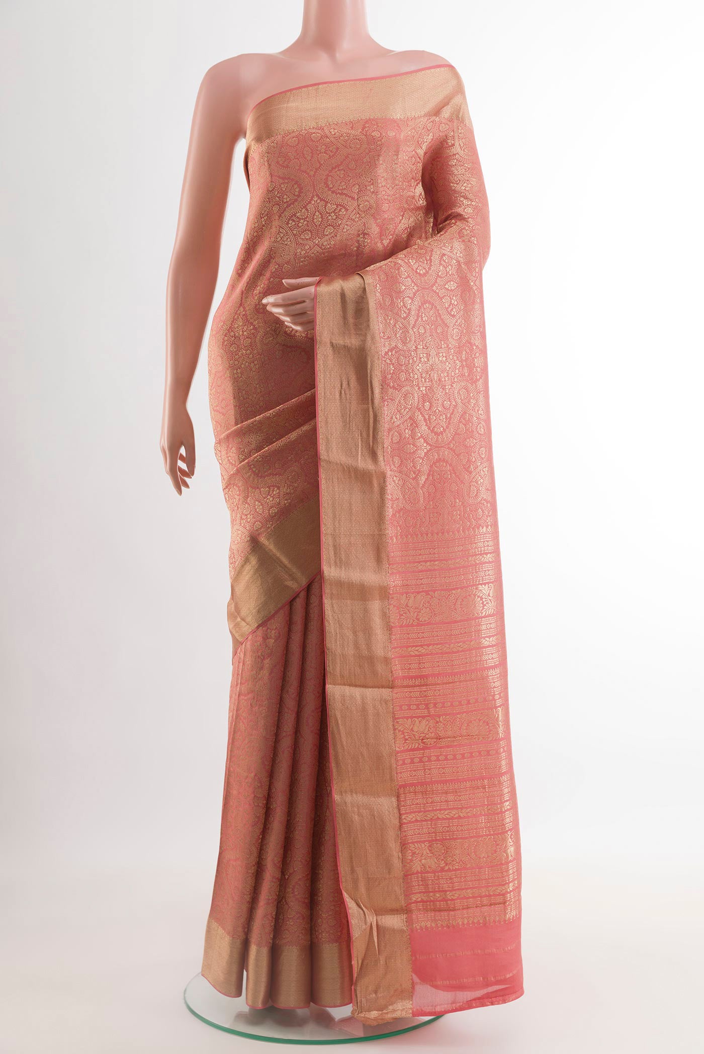 Coral Mysore Crepe Saree with Zari Brocade on the body and Zari Border.  displayed on a mannequin