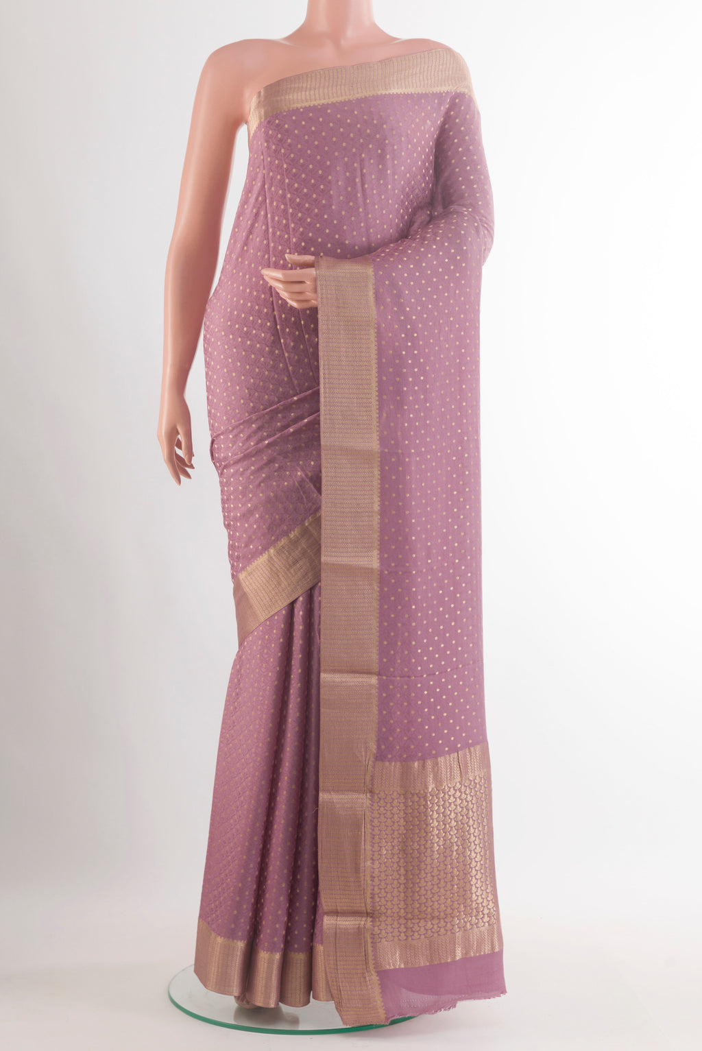 Lavender Mysore Crepe Saree with Jacquard With Zari Butta on the body and Zari Border.  displayed on a mannequin