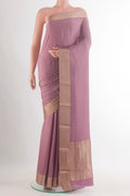 Lavender Mysore Crepe Saree with Jacquard With Zari Butta on the body and Zari Border.  displayed on a mannequin