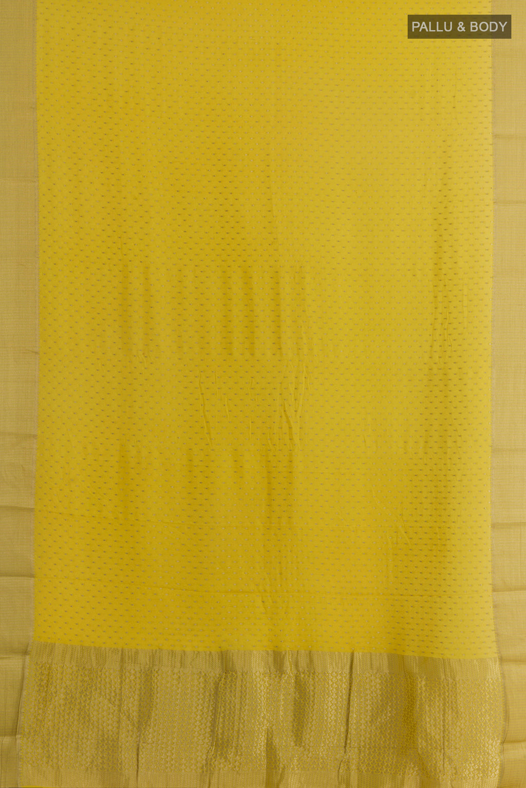 Flat view of Yellow Mysore Crepe Saree with Zari Butta on the body and Zari Border. 