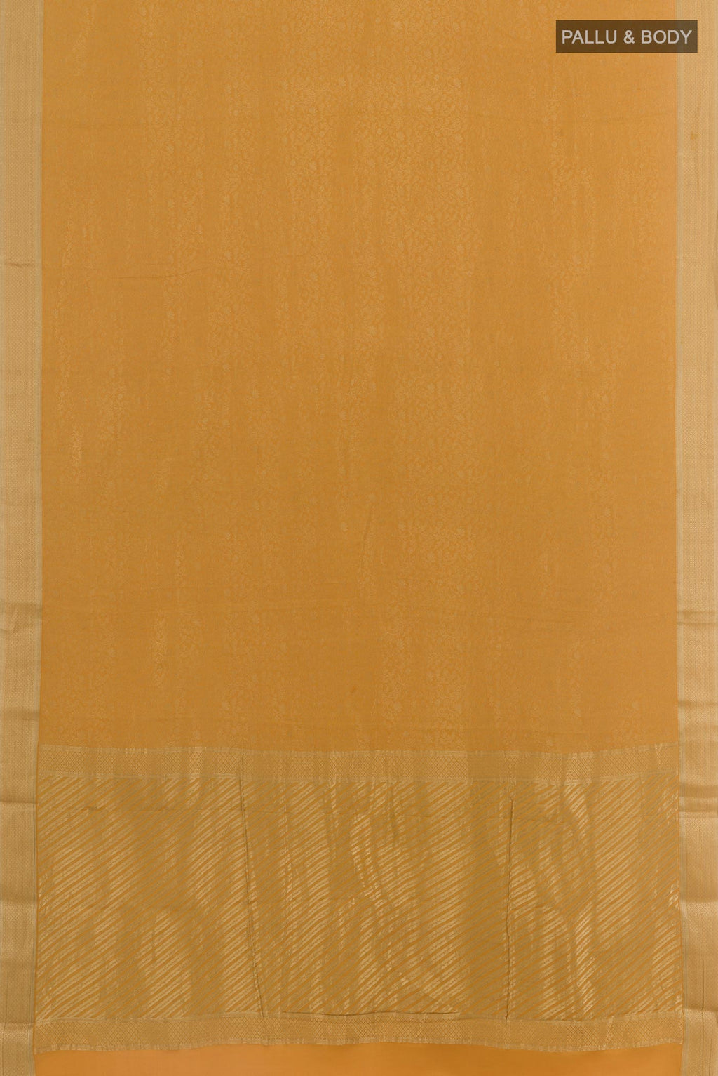 Flat view of Mustard Mysore Crepe Saree with Zari Brocade on the body and Zari Border. 