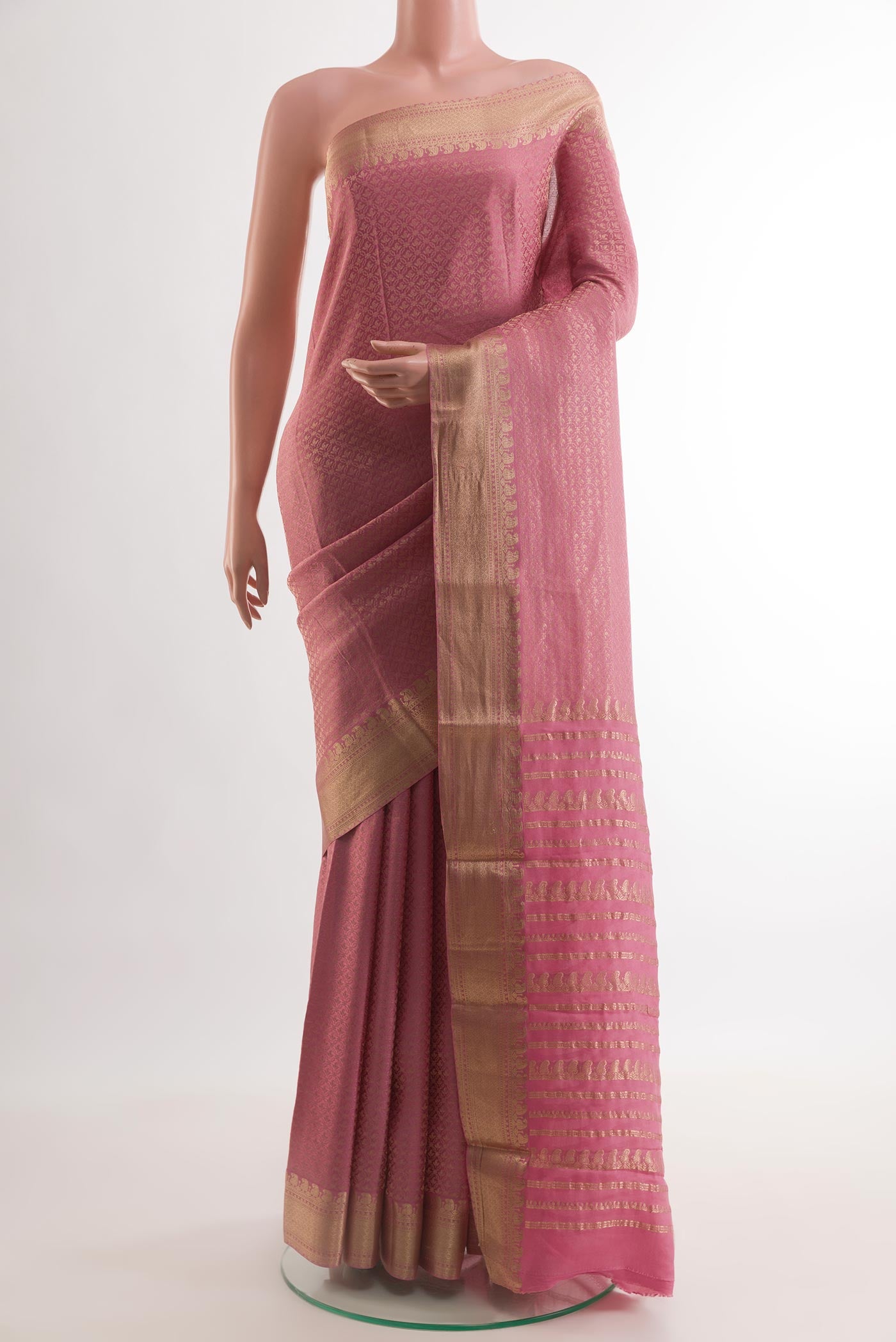 Pink Mysore Crepe Saree with Zari Brocade on the body and Zari Border.  displayed on a mannequin
