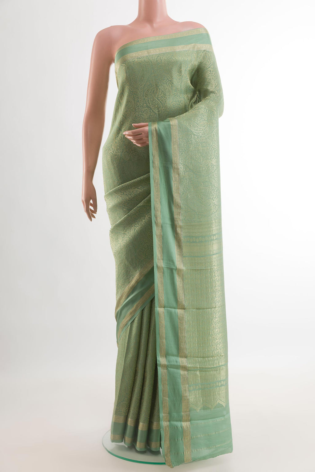 Sea Green Mysore Crepe Saree with Zari Brocade on the body and Plain Border.  displayed on a mannequin