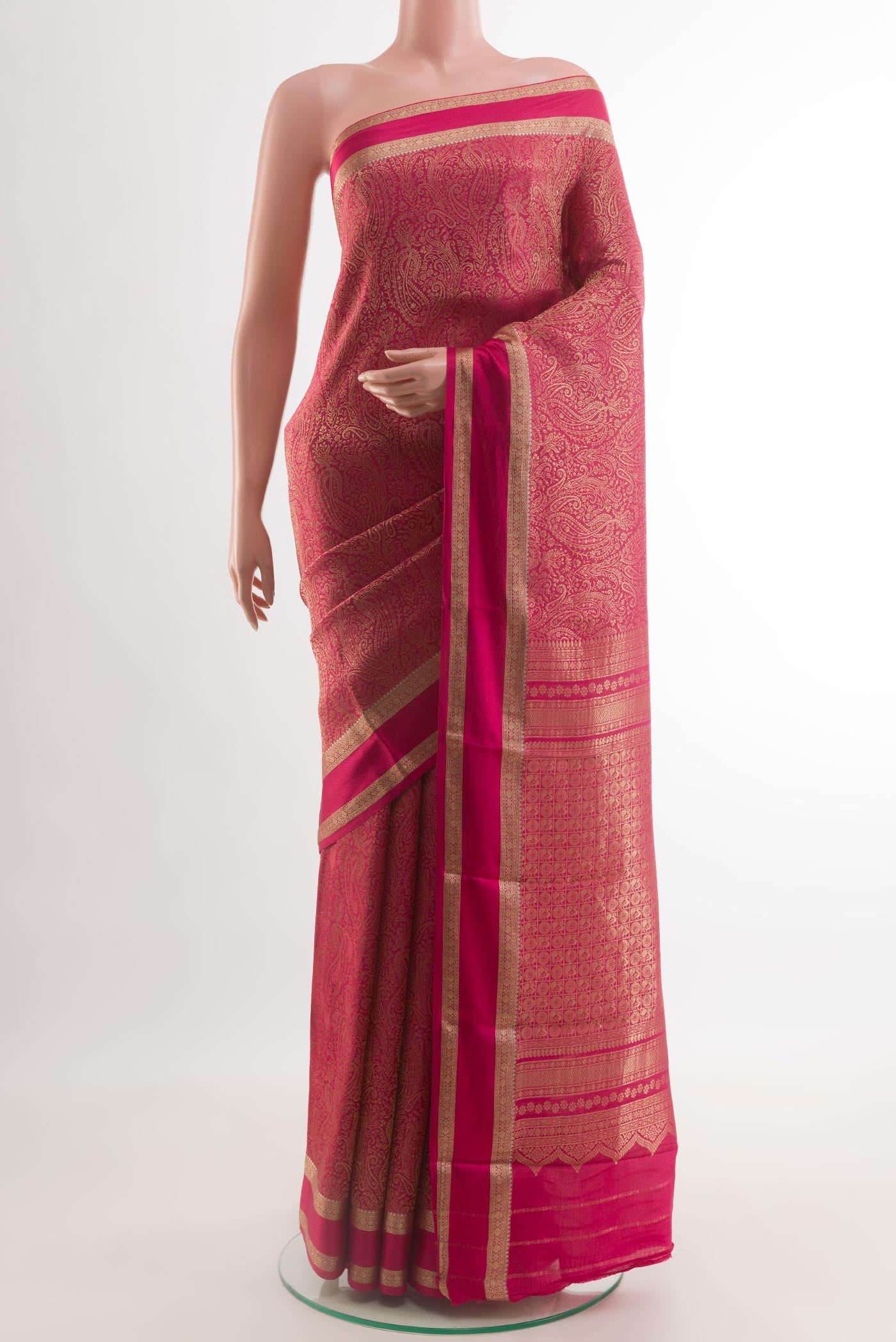 Pink Mysore Crepe Saree with Zari Brocade on the body and Zari Border.  displayed on a mannequin