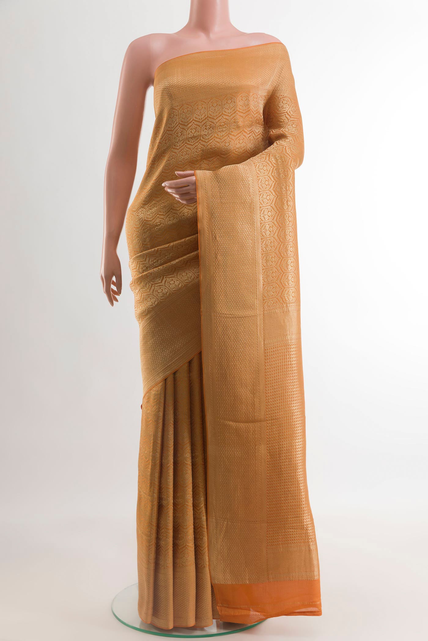 Rust Mysore Crepe Saree with Zari Brocade on the body and Zari Border.  displayed on a mannequin