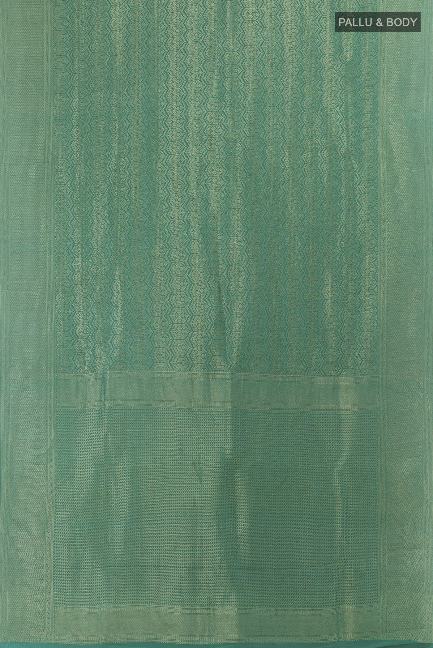 Flat view of Sea Green Mysore Crepe Saree with Zari Brocade on the body and Zari Border. 