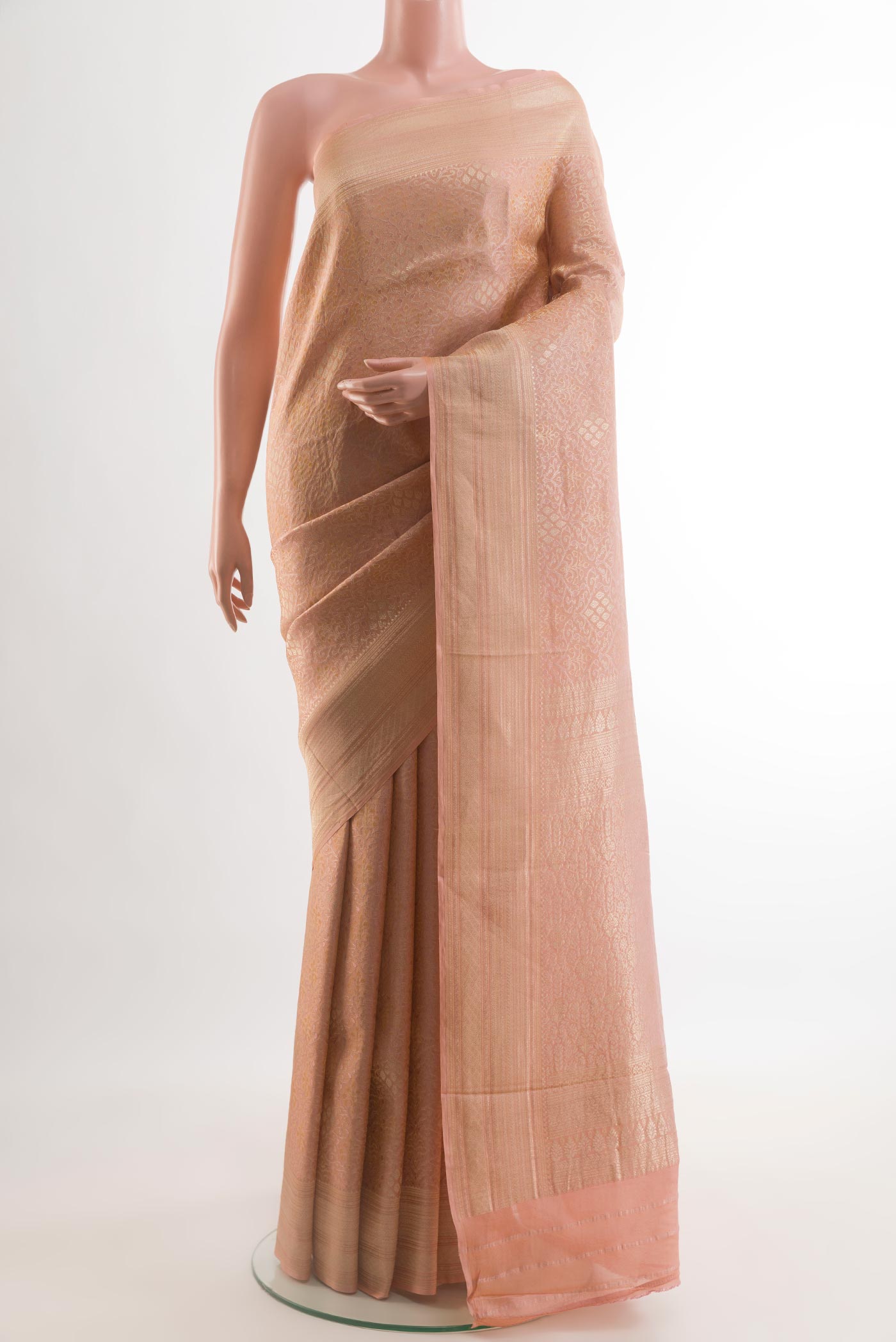 Rose Gold Mysore Crepe Saree with Zari Brocade on the body and Zari Border.  displayed on a mannequin