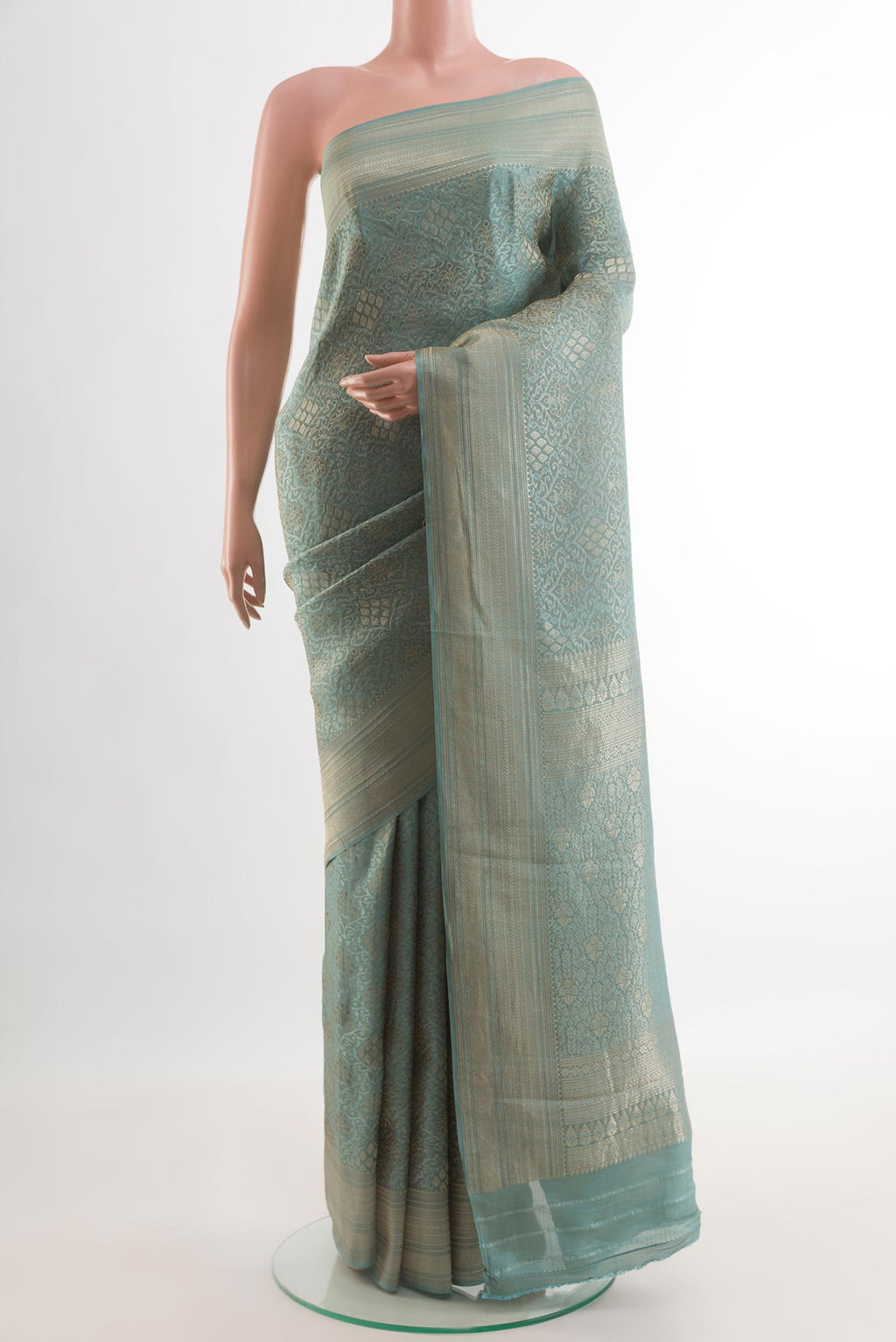 Blue Grey Mysore Crepe Saree with Zari Brocade on the body and Zari Border.  displayed on a mannequin