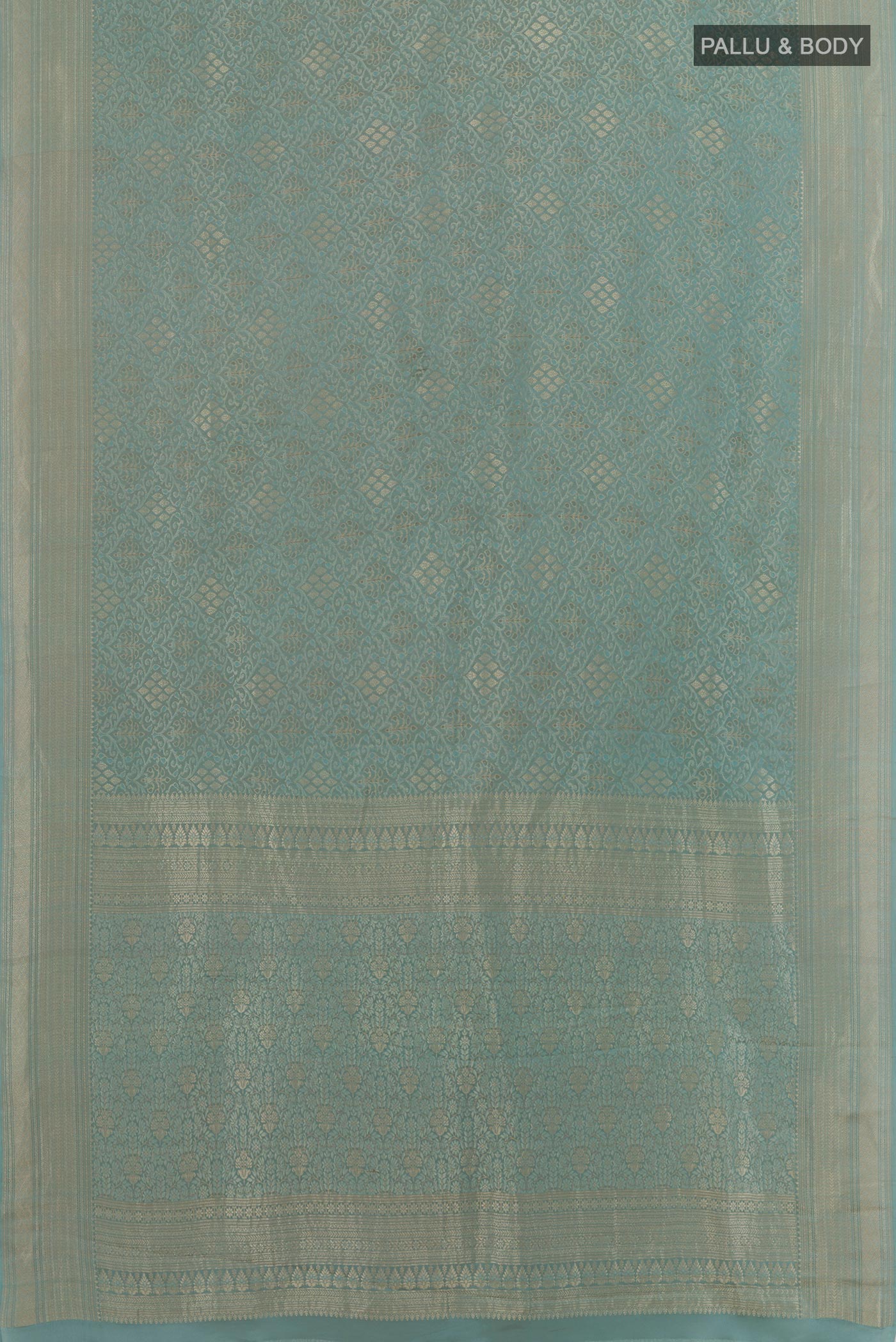 Flat view of Blue Grey Mysore Crepe Saree with Zari Brocade on the body and Zari Border. 