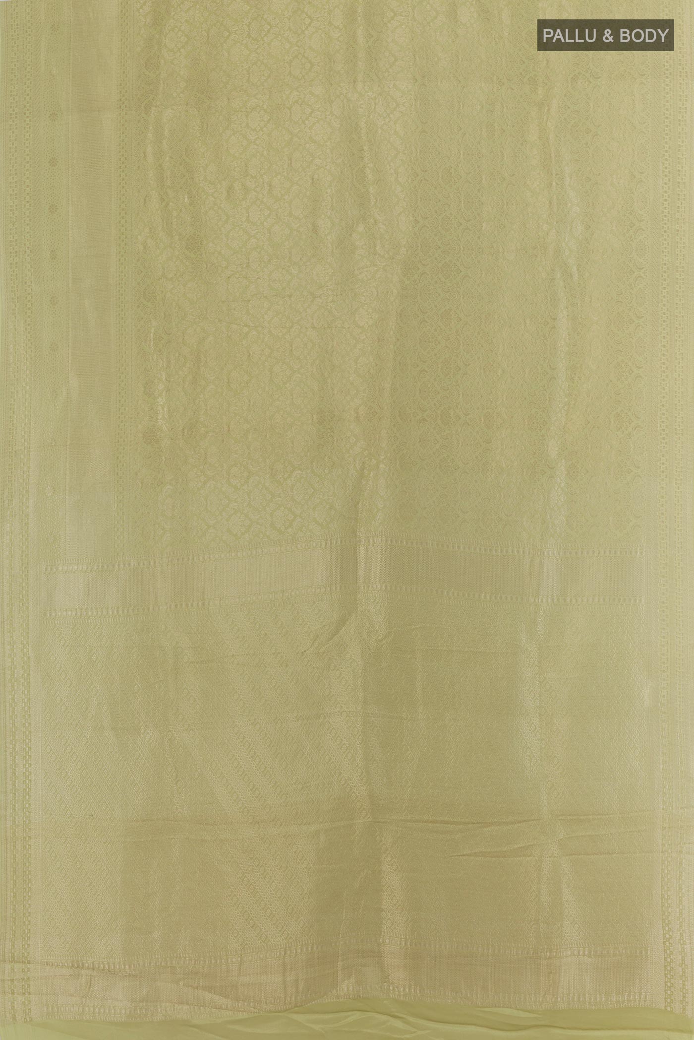 Flat view of Light Green Mysore Crepe Saree with Zari Brocade on the body and Zari Border. 