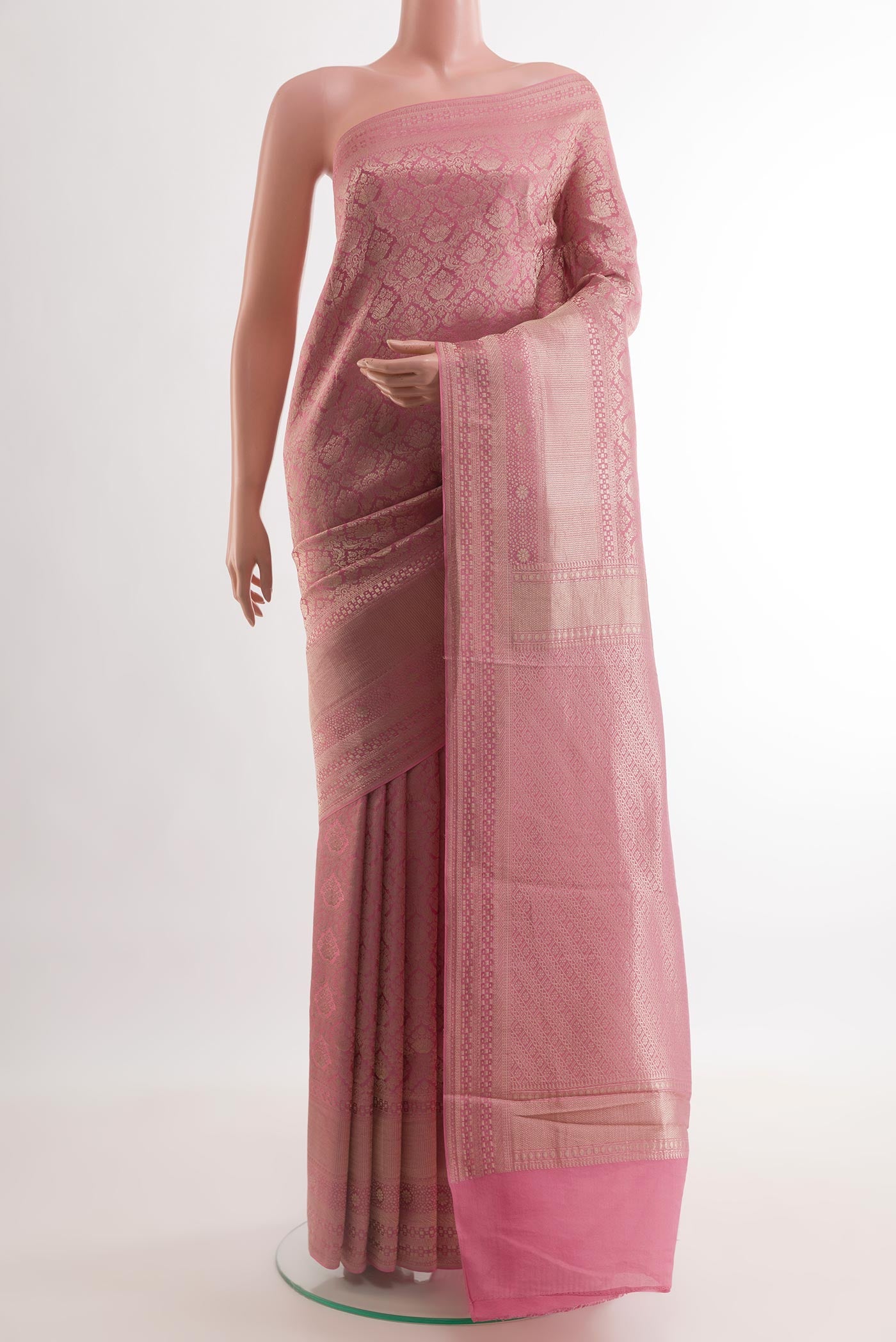 Pink Mysore Crepe Saree with Zari Brocade on the body and Zari Border.  displayed on a mannequin