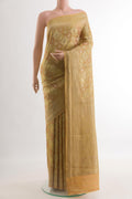 Beige Mysore Crepe Saree with Zari Brocade on the body and Zari Border.  displayed on a mannequin