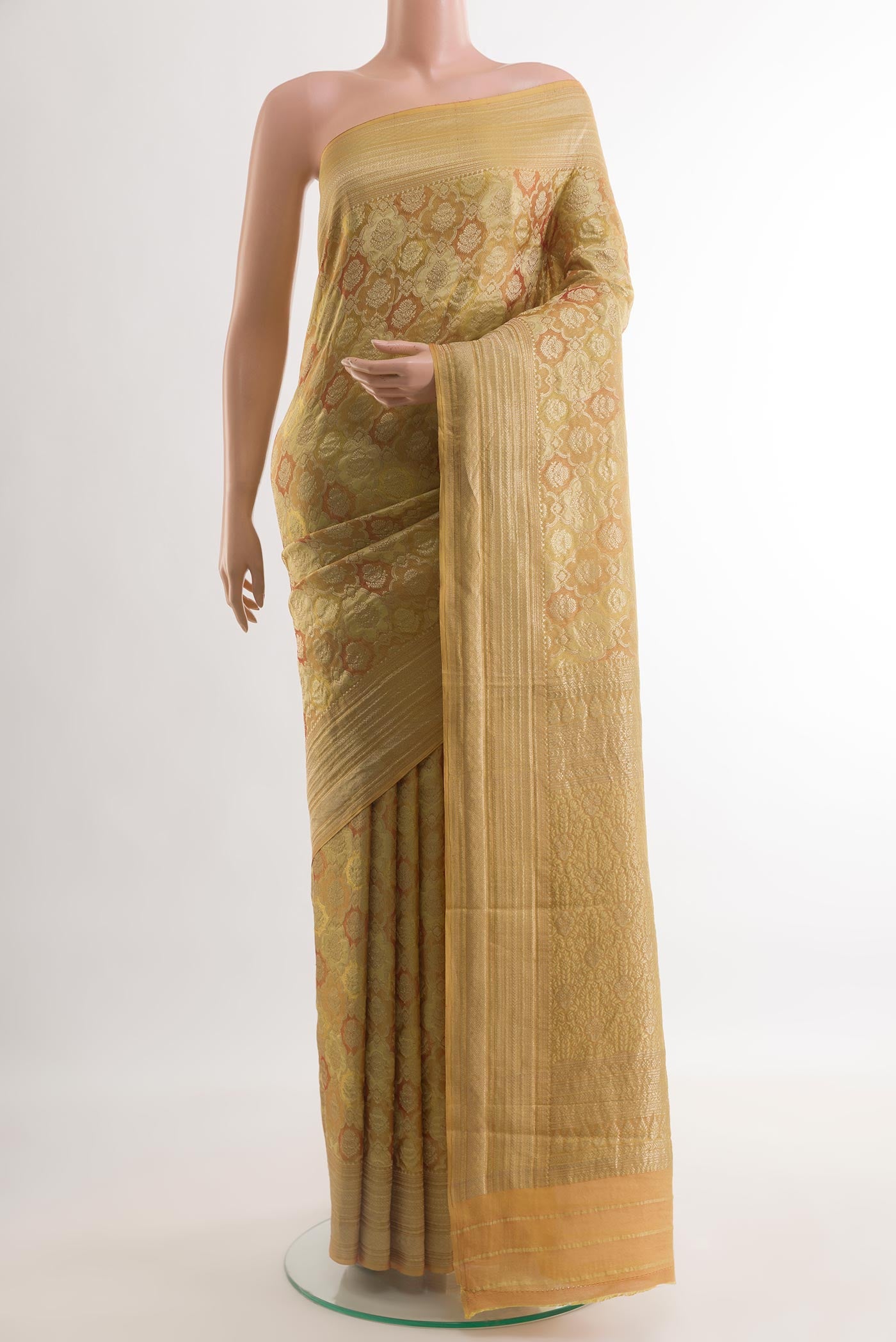 Beige Mysore Crepe Saree with Zari Brocade on the body and Zari Border.  displayed on a mannequin