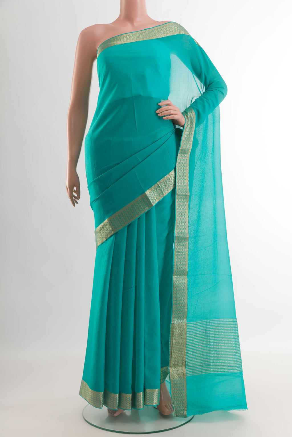 Blue Mysore Chiffon Saree with Plain Body and Zari Border.  displayed on a mannequin
