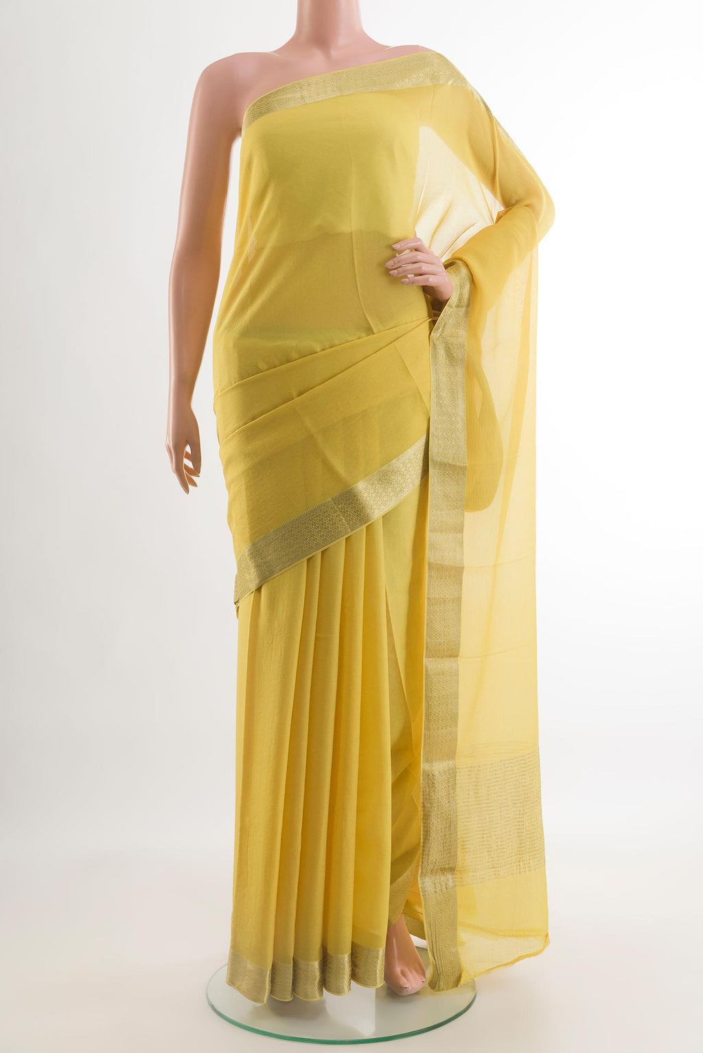 Yellow Mysore Chiffon Saree with Plain Body and Zari Border.  displayed on a mannequin